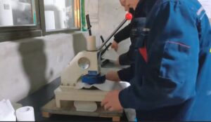 Quality control inspection line at a toilet paper production factory, ensuring product standards