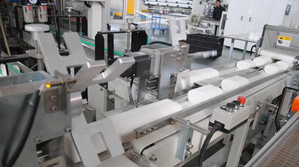 Mass production customization process at Top Source Hygiene