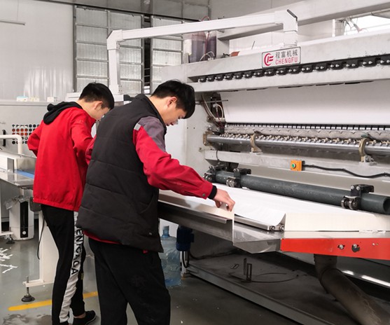 High-tech toilet paper production line showing the manufacturing process at Top Source Hygiene.