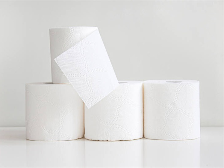 A single roll of premium toilet paper from Top Source Hygiene, made from 100% virgin pulp.