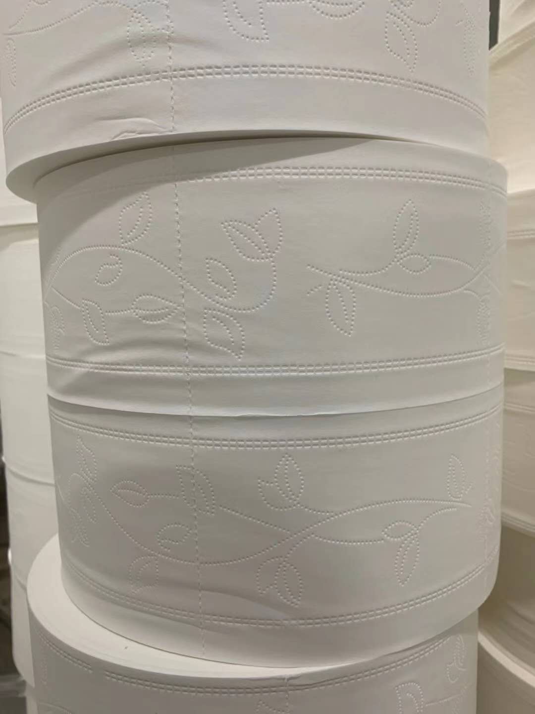 High-quality commercial toilet paper rolls stacked ready for use