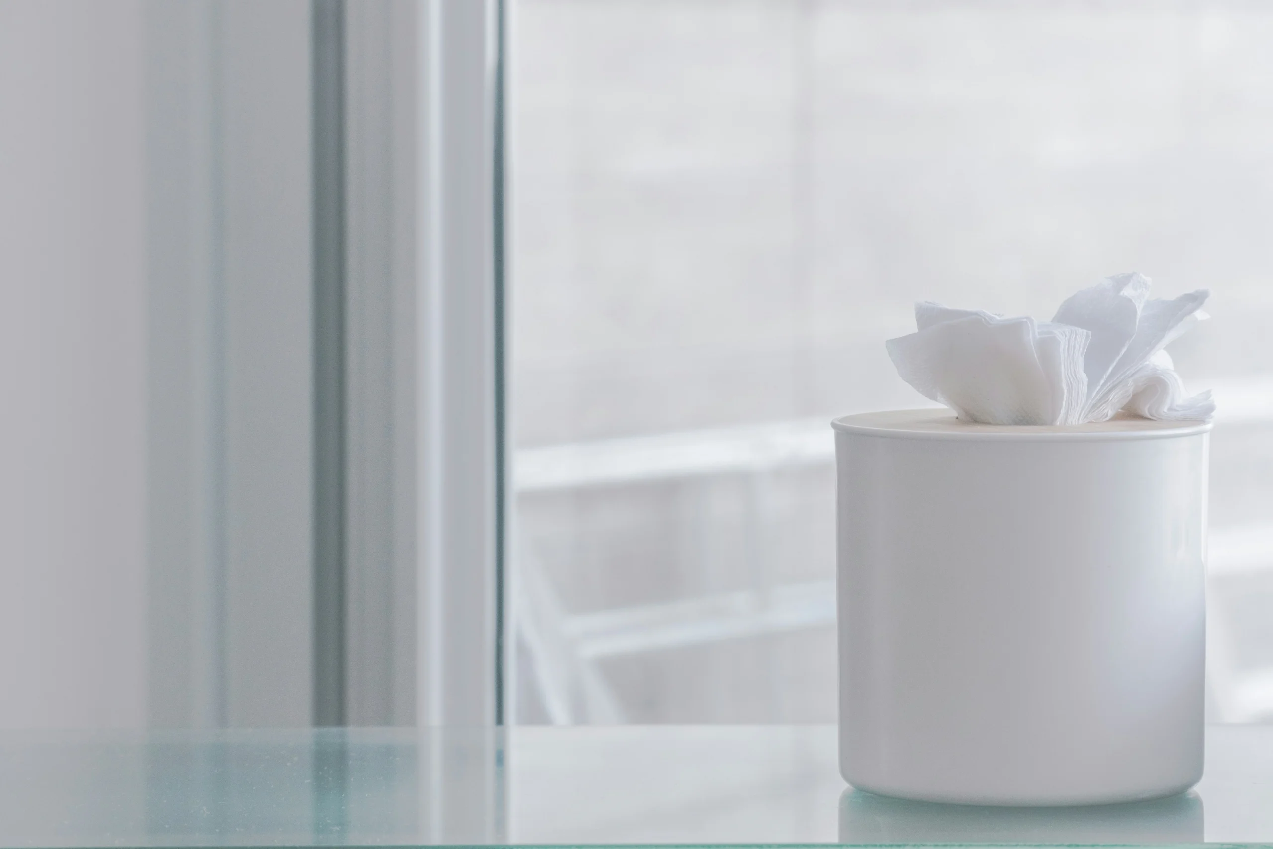 white plastic facial wipes dispenser