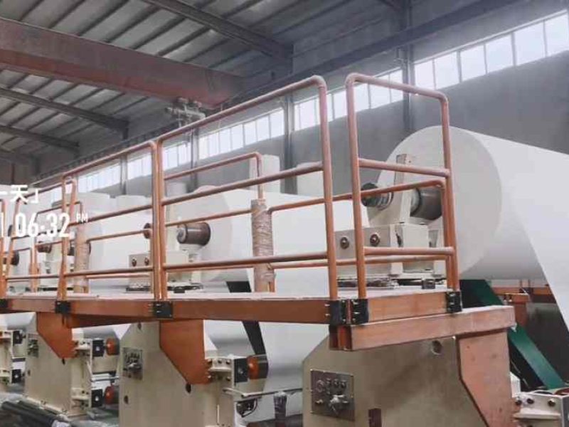 A panoramic view of a modern tissue paper machine in operation