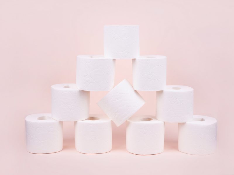 Toilet,Paper,Rolls,Stacked,In,The,Shape,Of,A,Pyramid.