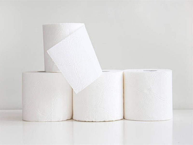 A single roll of premium toilet paper from Top Source Hygiene, made from 100% virgin pulp.